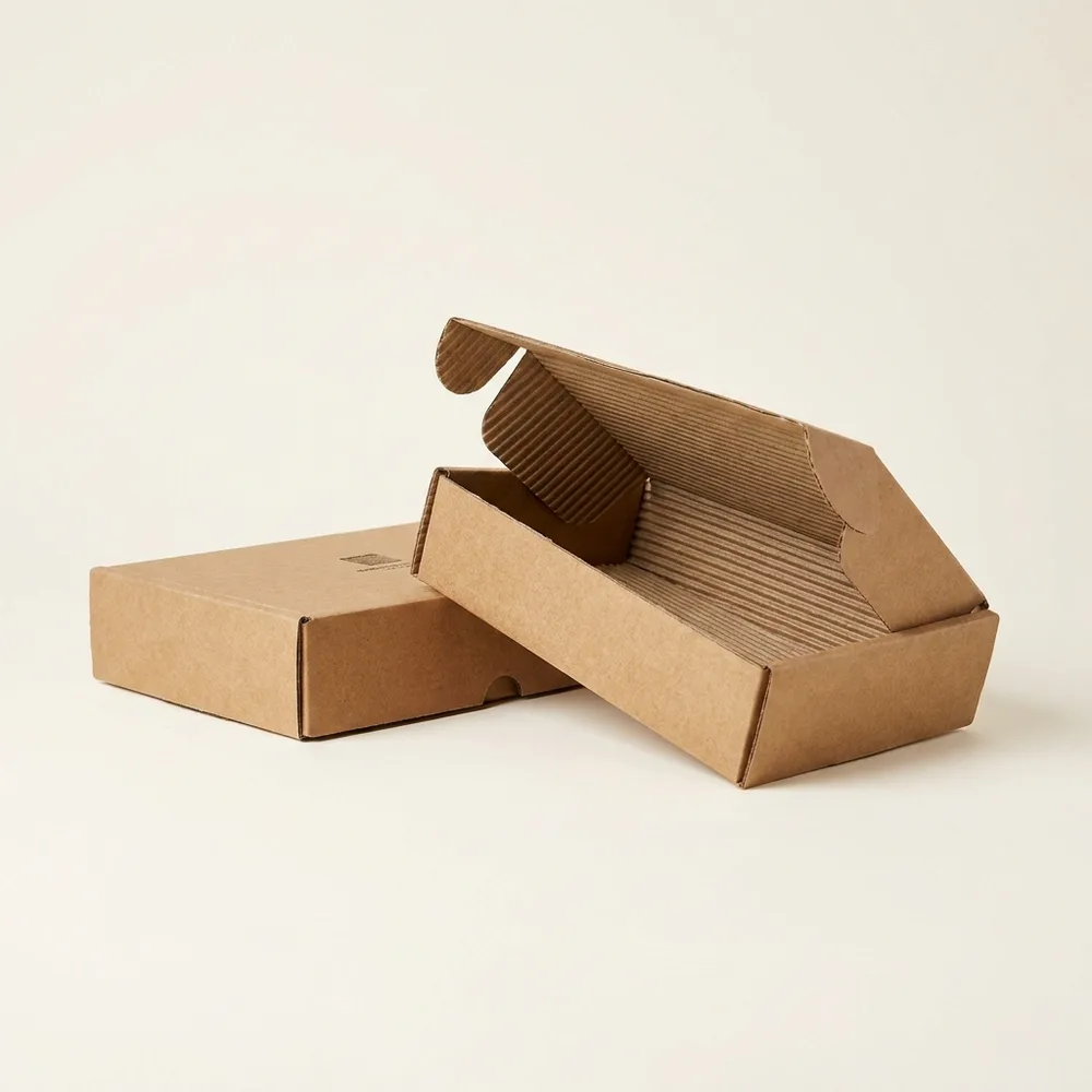 Eco friendly brown kraft candle box with minimal logo print